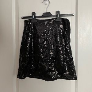 Dynamite. Black sequin mini skirt in XXS.